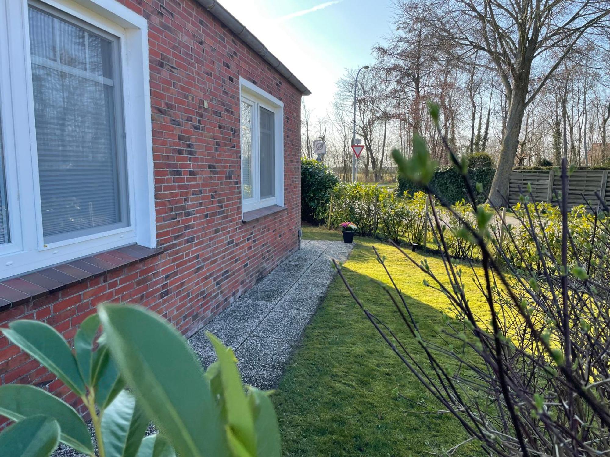 Heel Wat Besuenners Apartamento Krummhörn Exterior foto
